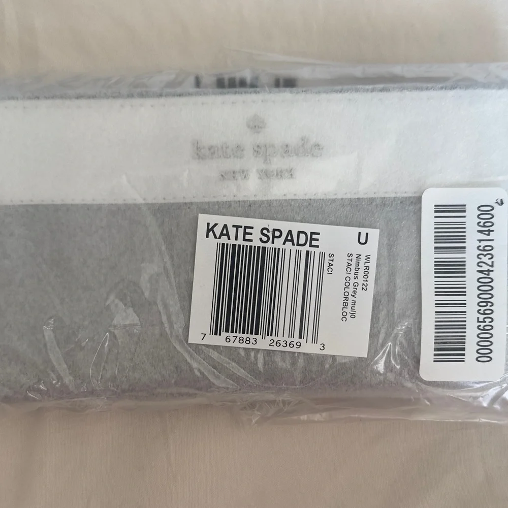 Kate Spade New York | Large Slim Bifold Leather Wallet in Nimbus Grey | NWT NEW